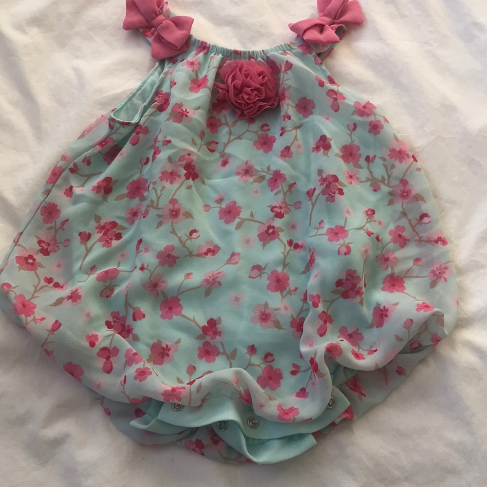 Infant one piece with bottom snaps